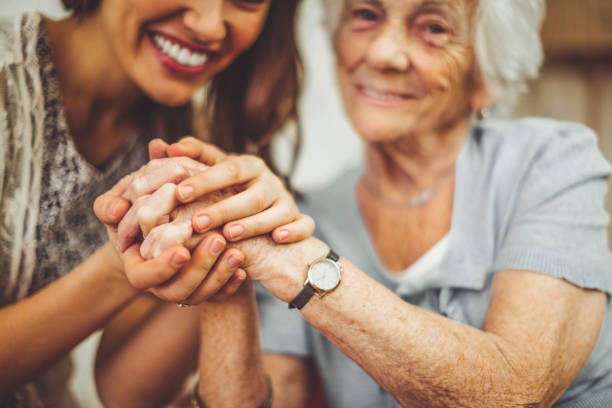 assisted_living_memory_care_female_resident_caregiver-1