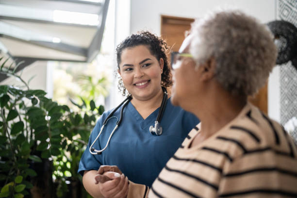 istockphoto-hispanic care giver w elderly woman