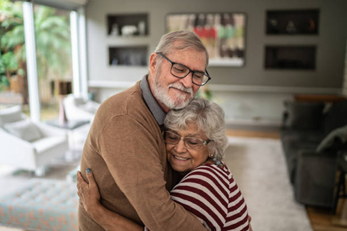 adult_man_hugging_elderly_mother